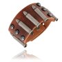Brown leather strap, cartridge cases, rivets, button closure, adjustable closure