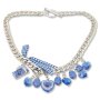 Bavarian style necklace with bow and different pendants, blue