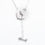 Fine stainless steel necklace with heart and dog bone pendant,Length 42cm silver
