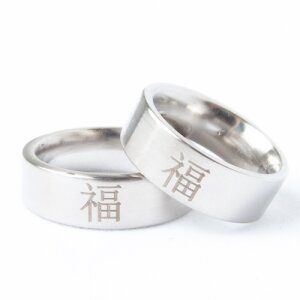 Stainless steel ring box with 12 pieces with Asian...