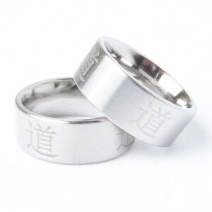 Stainless steel ring box with 12 pieces with Asian characters, size mixed