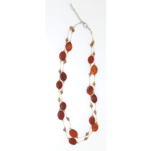 Golden necklace with red gemstones