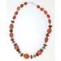 Necklace with orange gemstones, different coloured pearls and wooden beads