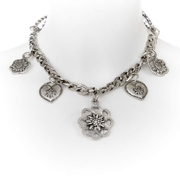 Edelweiss Trachten trouser chain in antique silver look with many pendants in flower and coin form.